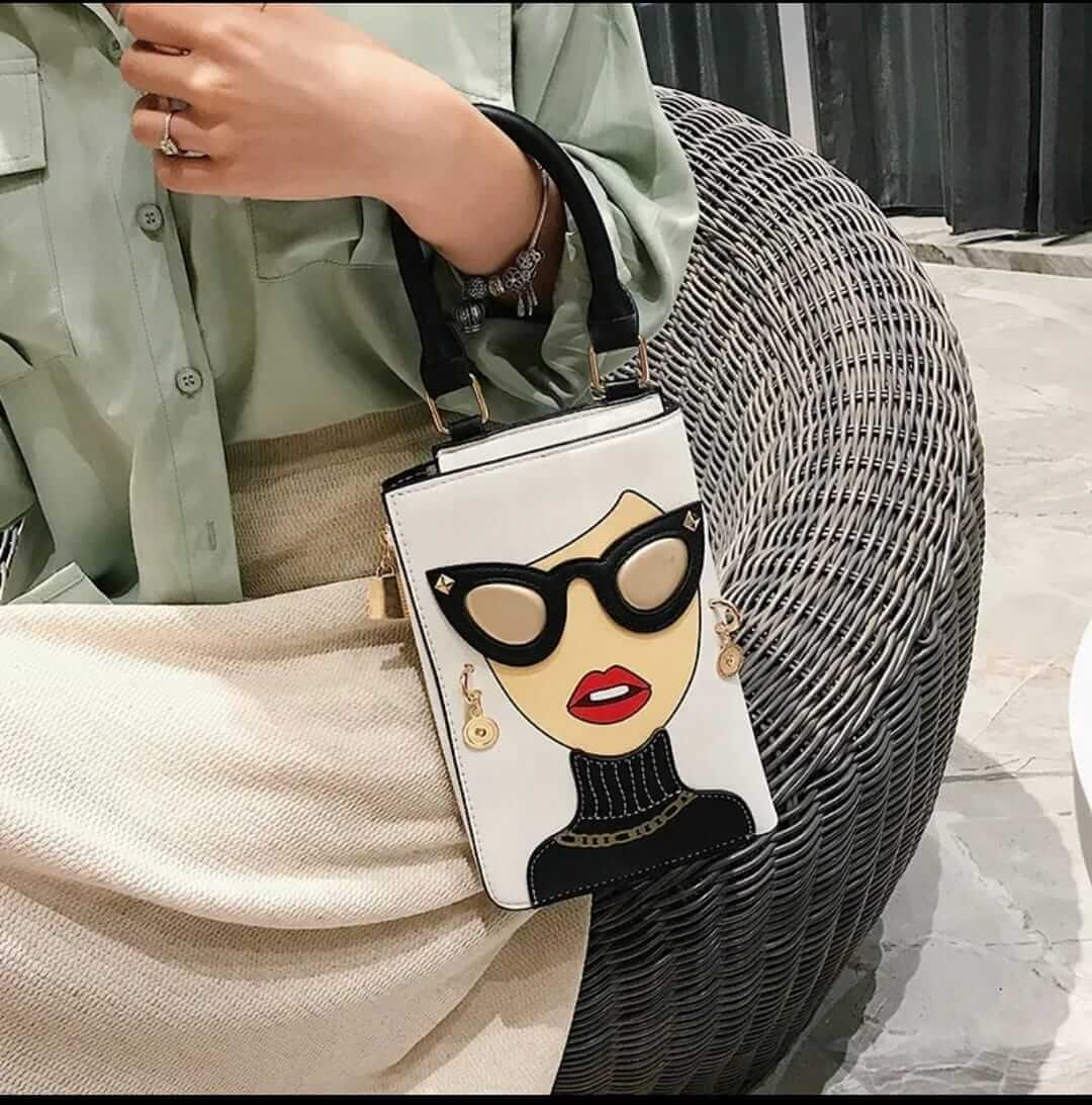 A soft 23 × 17cm crossbody with a zip and 50cm strap