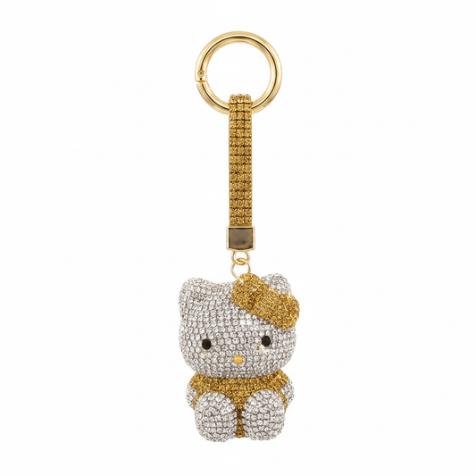 A rhinestone poodle charm in white, purple or gold