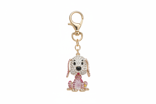 A rhinestone poodle charm in white, pink or black