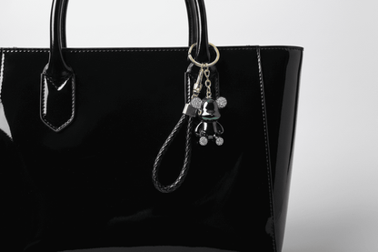 Dark Iridescent Bear Keychain on Black Glossy Tote