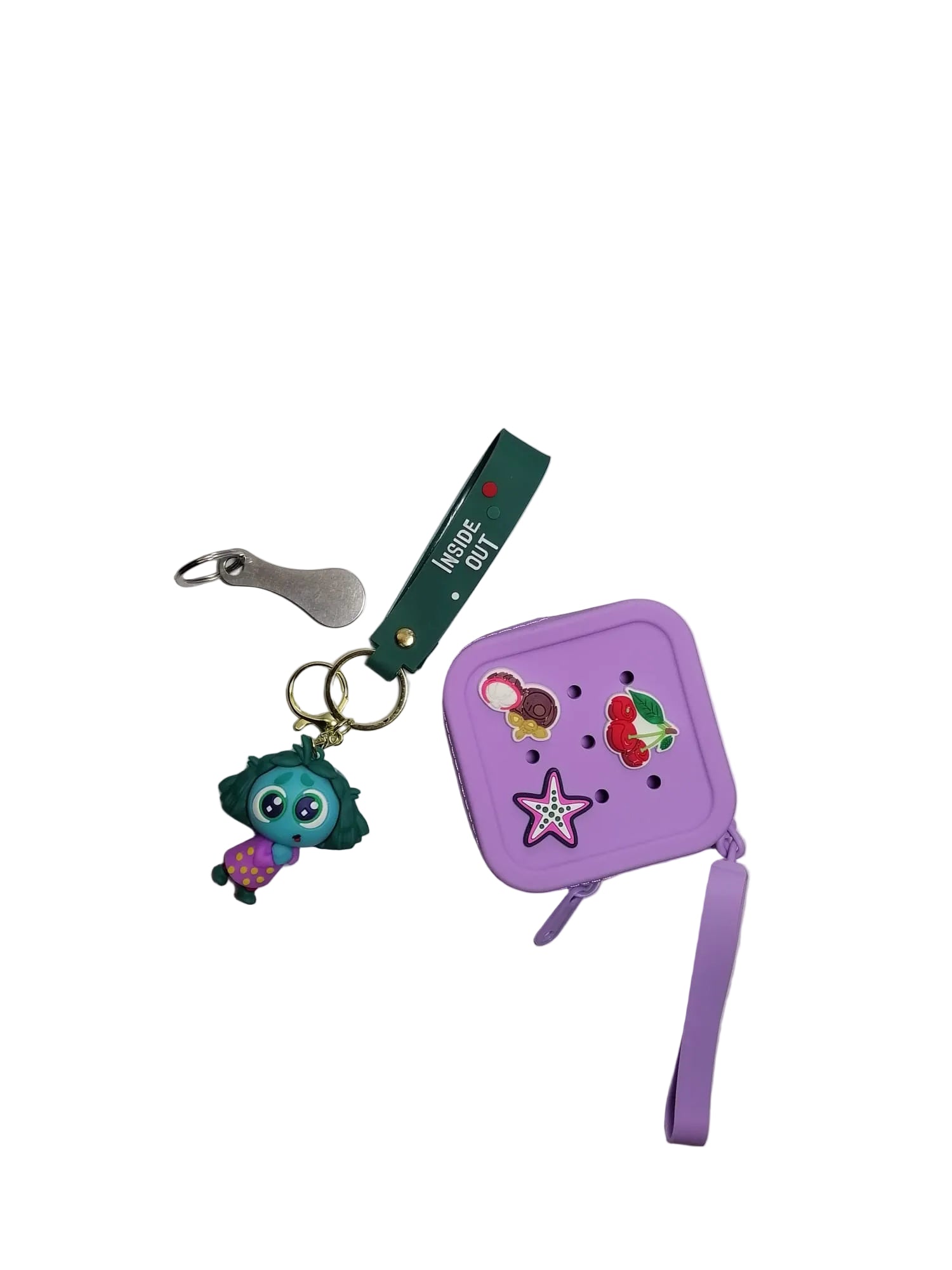 Purple pouch with cartoon character keychain on a white surface