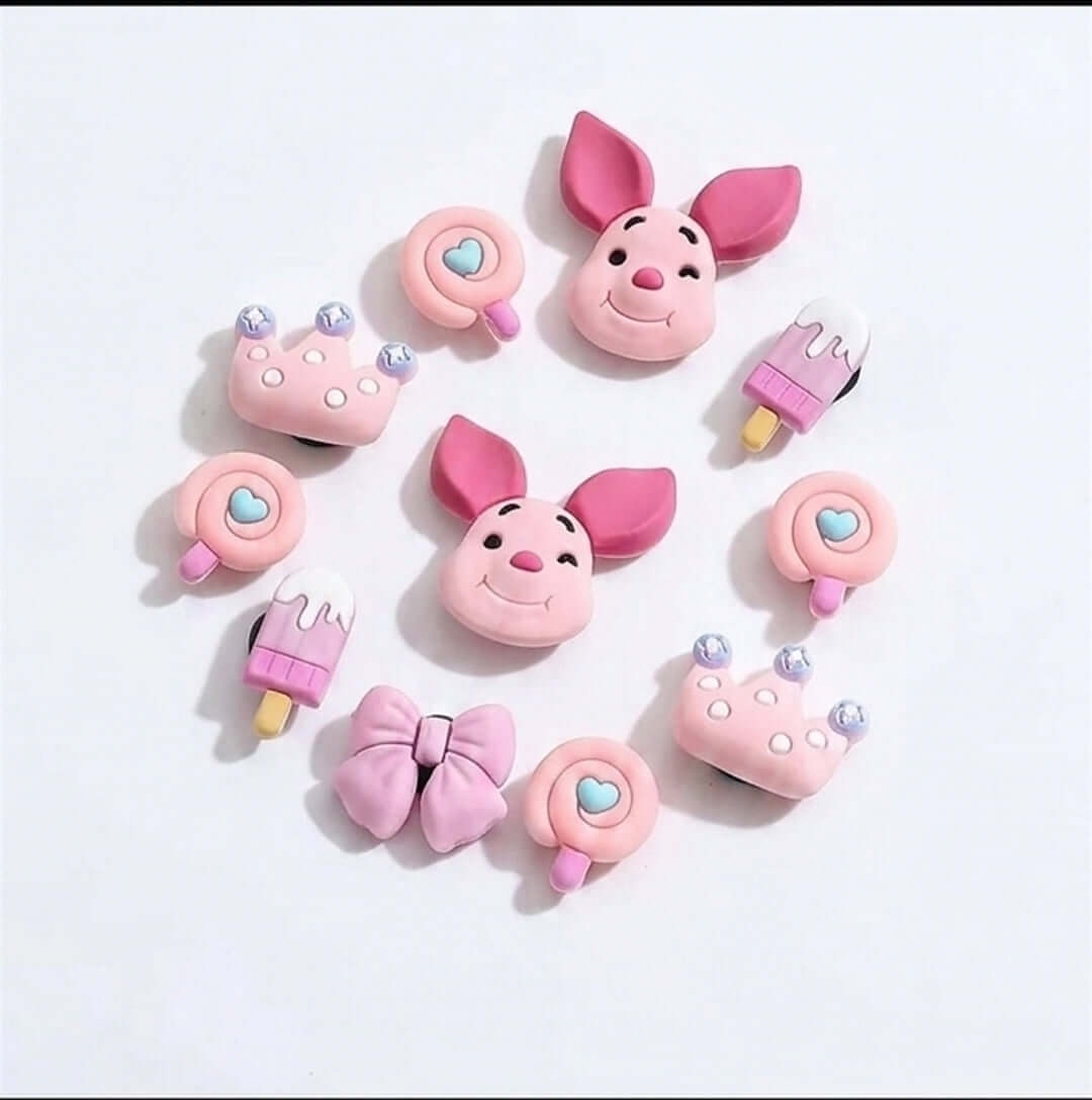 Set of pink cartoon character-themed products on a white background