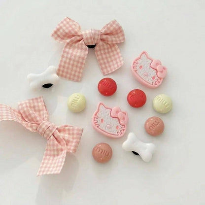 Kawaii-themed items including bows and character-shaped candies on a light background