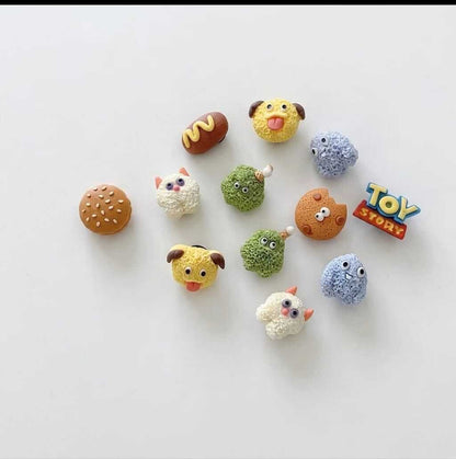 Collection of colorful toy figures on a white background