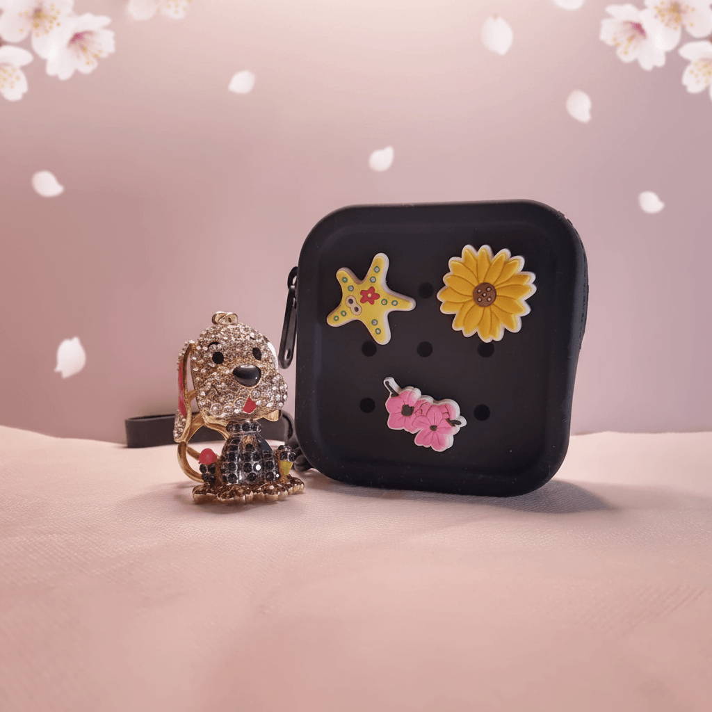 Ugochi 7cm crystal dog keychain clipped to a handbag strap