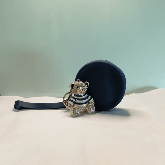 Nwamaka set by GrinSquid — round silicone coin purse with Ebele crystal teddy bear charm in striped enamel outfit